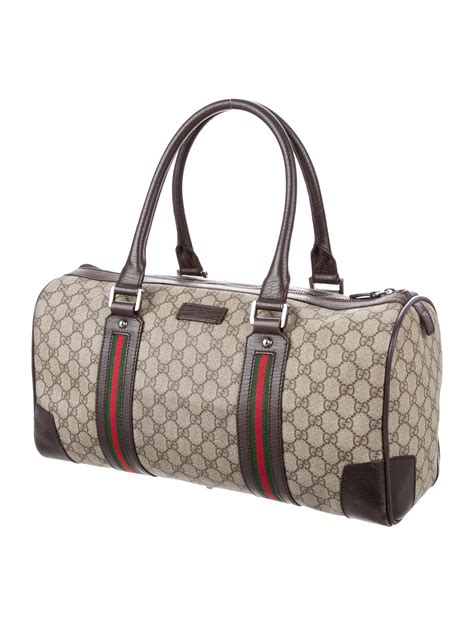 gucci duffle bags.